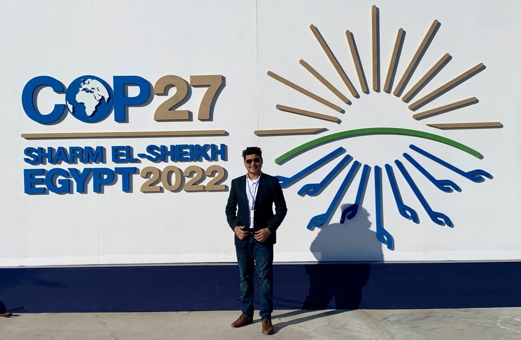 COP 27 logo (COP 27 Sharm el-Sheikh Egypt 2022); Photo of Dhruv Jhaveri